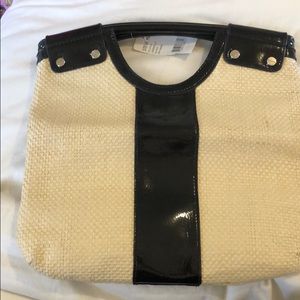 Steve Madden black and white straw clutch